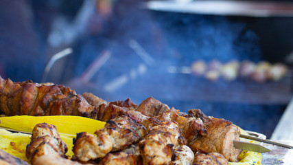 Street food, grilled meat on a spit. Homemade.