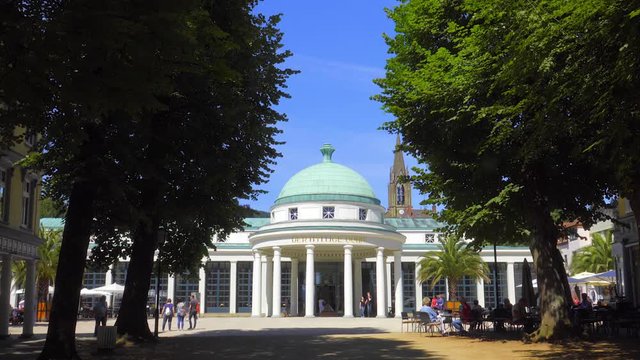 BAD PYRMONT, GERMANY - Juli 7, 2018: The Hyllige Born with Wandelhalle on a beautiful day.