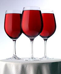 THREE GLASSES OF RED WINE