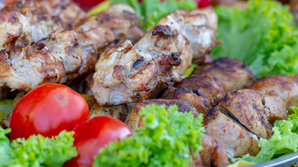 Street food, grilled meat on a spit. Homemade.