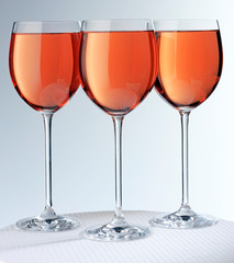 THREE GLASSES OF ROSE WINE