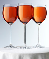 THREE GLASSES OF ROSE WINE