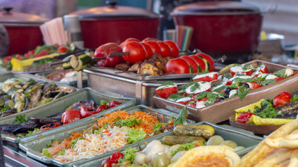 B-B-Q. vegetarian street food. Vegetables and fruits cooking on an open fire