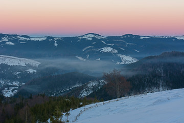 Sunset in the mountains in winter