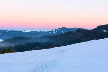 Fototapeta na wymiar Sunset in the mountains in winter