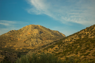 vivid highland mountain scenery landscape on bright blue sky background in clear summer weather day time