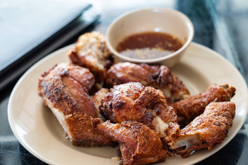 Fried chicken with spicy source in Thailand