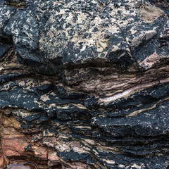 Colourful cliff face rock in Pembrokeshire, Wales