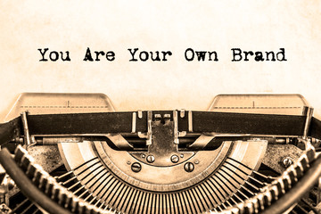 the word you Are your Own Brand printed on a vintage typewriter.