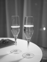 champagne in two glasses, celebrating