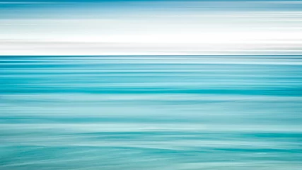 Leerer Meer- und Strandhintergrund mit Kopierraum, Langzeitbelichtung, Bewegungsunschärfe blauer abstrakter Vintage getönter Gradientenhintergrund © Aleksandr Matveev