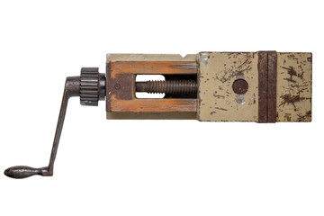 Tools isolated. Vise. Top view on large metal heavy industrial vise with screw mechanism and handles isolated on a white background. A old and rusty machine vise suitable for montage on a drill press.