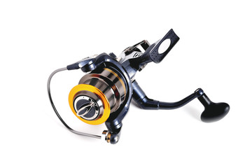 Coil for fishing inertial blue color on white background close-up isolate