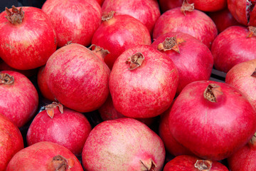Red pomegranates in the market