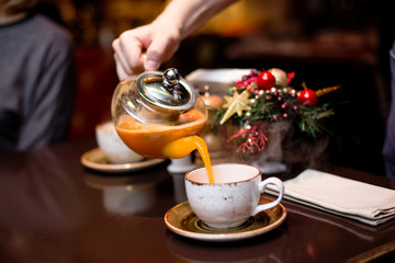 cup of tea with teapot and cup of tea