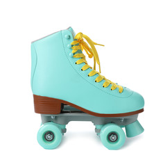 Pair of stylish quad roller skates on white background