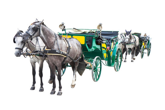 Two old carriages pulled by a couple of horses - image isolated on white background
