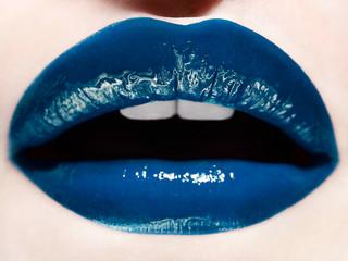 Close up of lips with blue lipstick