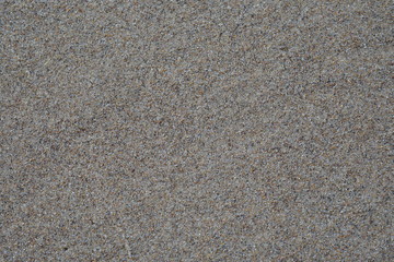Fine sand texture and background. River Quartz Particles.