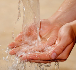 HANDFUL OF WATER FROM WATER FOUNTAIN