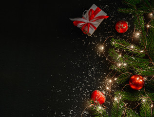 Dark Christmas background with small lights. Place for text. Blank for postcard or poster.