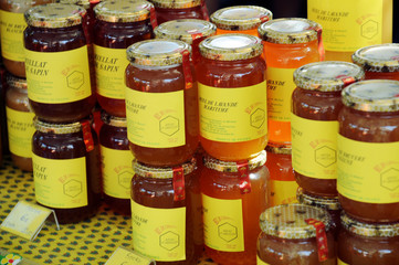 JARS OF HONEY IN MARKET,FRANCE