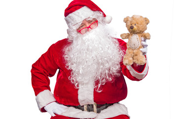 Portrait of santa claus with teddy bear doll on white background,Thailand people wear santa claus dress,Sent happiness for children,Merry christmas,Welcome to winter