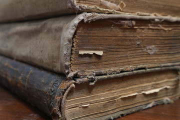 Yellowed pages of the old dilapidated book. Old book.