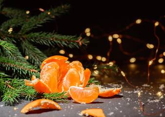 Dark Christmas background with small lights. Place for text. Blank for postcard or poster.