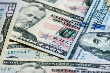 Closeup of dollar banknotes. American cash money background.
