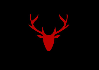 silhouette of a red deer head on a dark background