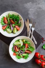 Fresh salad in bowls