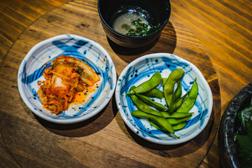 Korean BBQ with kimchi and beans