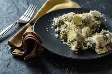 Brussels sprouts baked with cottage cheese in sour cream