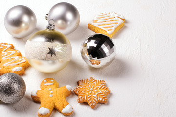 Silver balls on a white background. Christmas background.