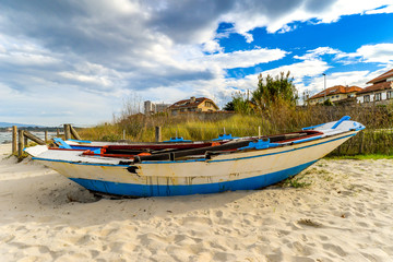 Naklejka na ściany i meble Colorful boats on the beach