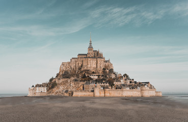 Mont-saint Michel. France.  Castle by the water.  - obrazy, fototapety, plakaty