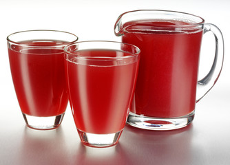 GLASS AND JUG OF CHERRY JUICE