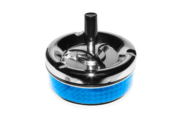 Metal ashtray with spinning mechanism on a white background.