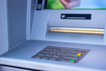 ATM machine blue background 
