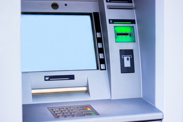 ATM machine blue background 