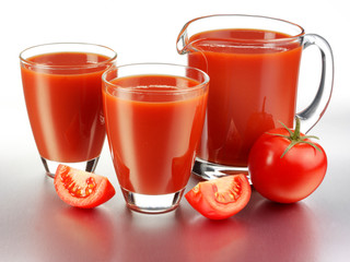 GLASS AND JUG OF TOMATO JUICE