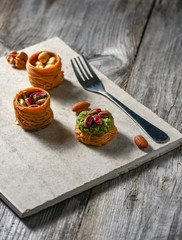 Turkish delight on white rustic background. Turkish deligh set. Assorted traditional turkish delight on light background