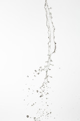 water splash with a lot of drops on a gray background