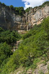 Green forest around Waterfall Skaklya near village of Zasele at Vazov trail, Balkan Mountains, Bulgaria