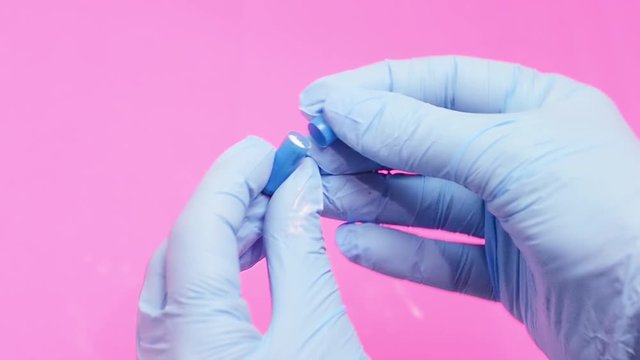 Closing a capsule with a counterfeit drug.