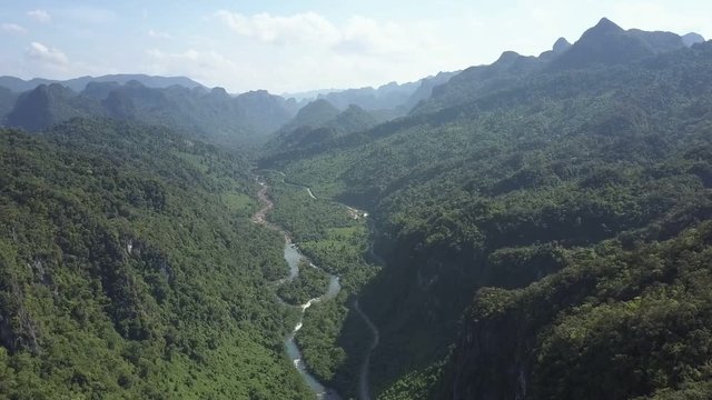 aerial picture tropical highland with river road in canyon
