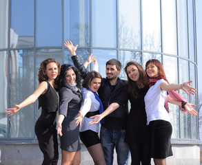 Fototapeta premium successful business team showing their success. concept of teamwork
