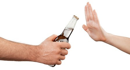 Someone refusing a drink