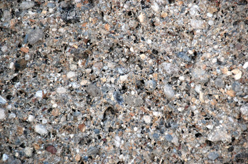 Many colorful pressed sea stones